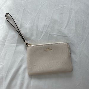 Coach cream wristlet